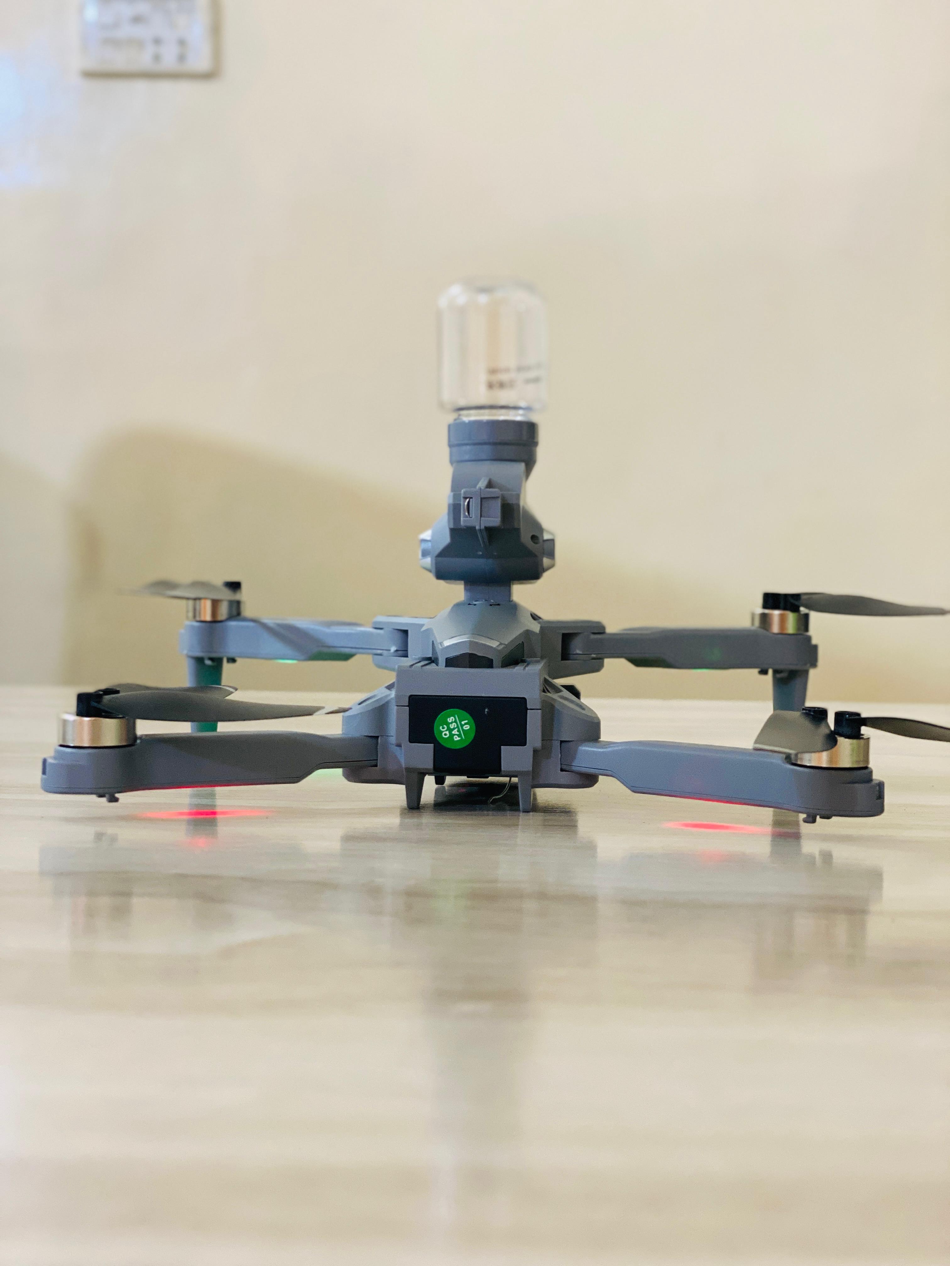Foldable Brushless motor drone K11 camera triple camera drone with Brushless motor Bullets fire drone