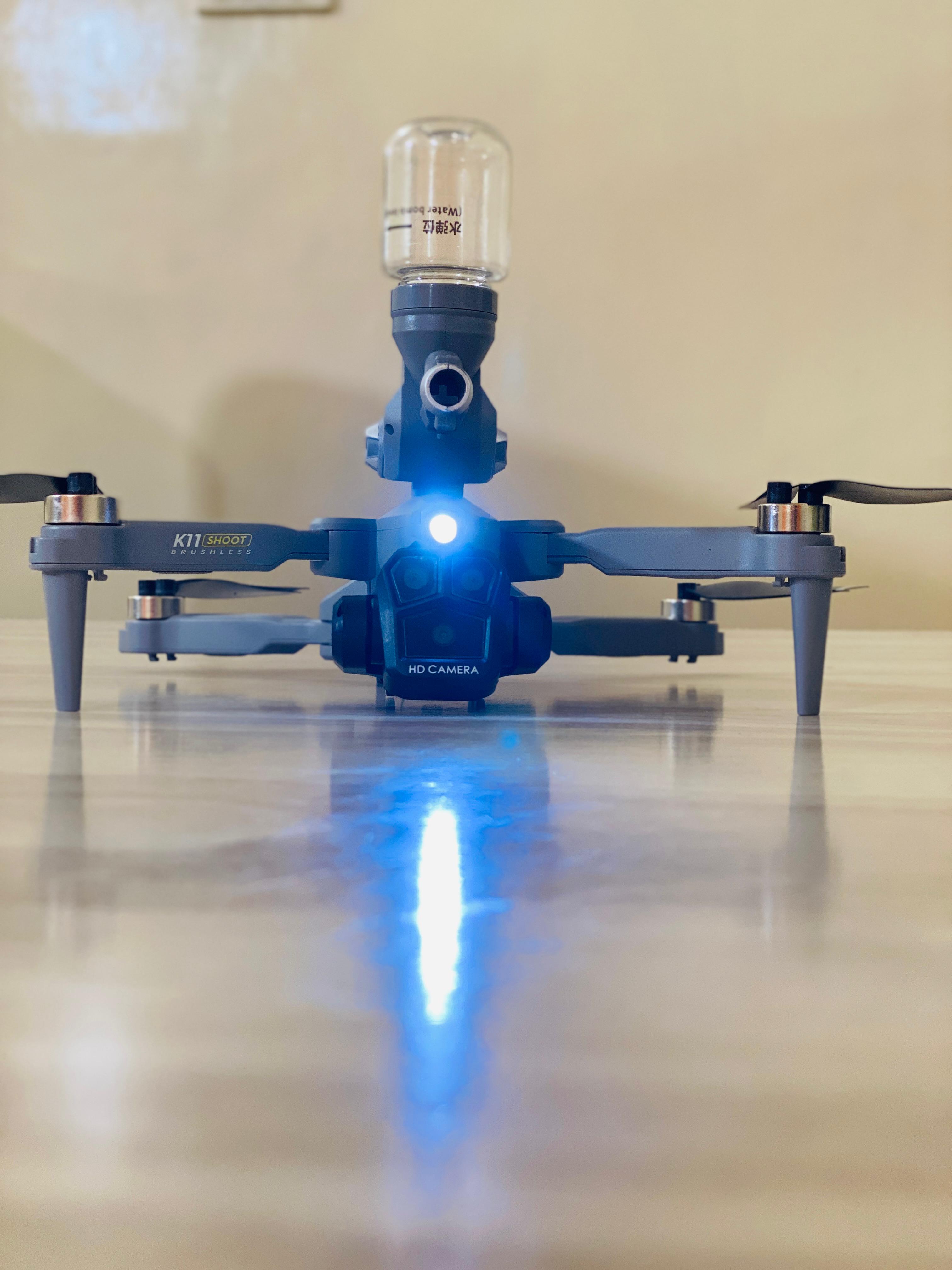 Foldable Brushless motor drone K11 camera triple camera drone with Brushless motor Bullets fire drone