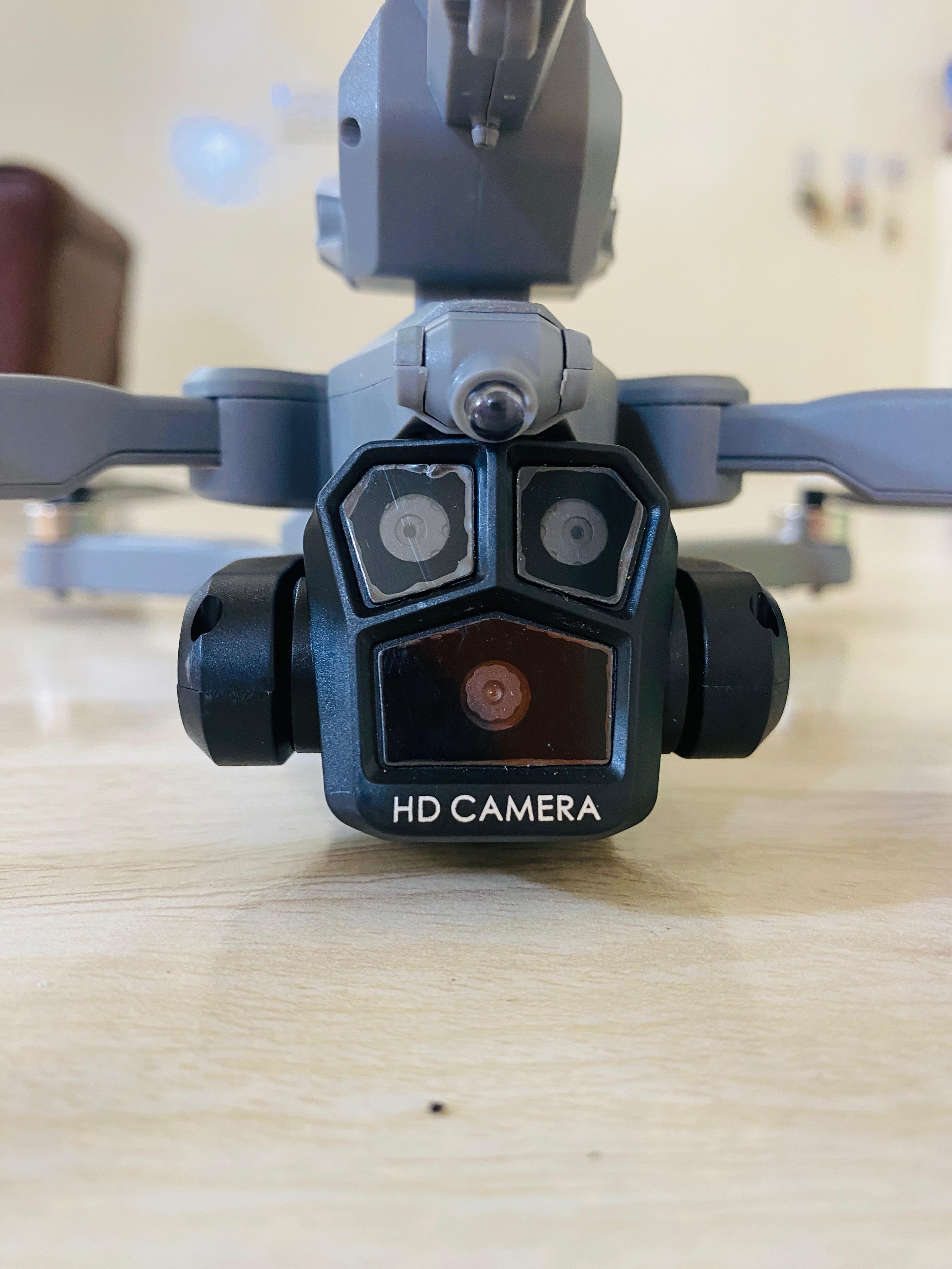Foldable Brushless motor drone K11 camera triple camera drone with Brushless motor Bullets fire drone